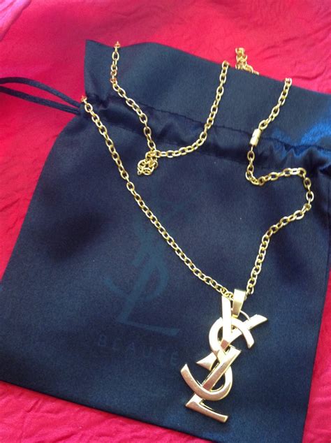 necklace yves saint laurent|saint laurent pendant.